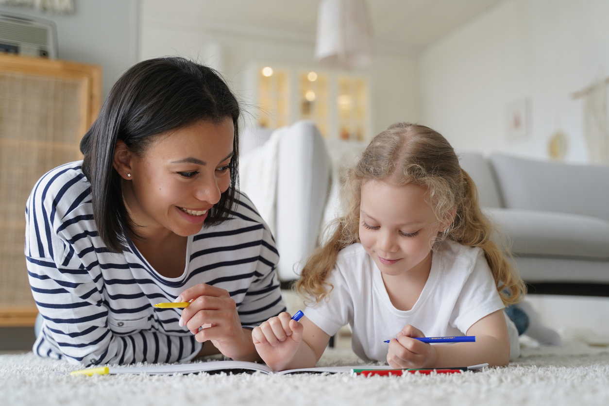 caregiver playing with foster child